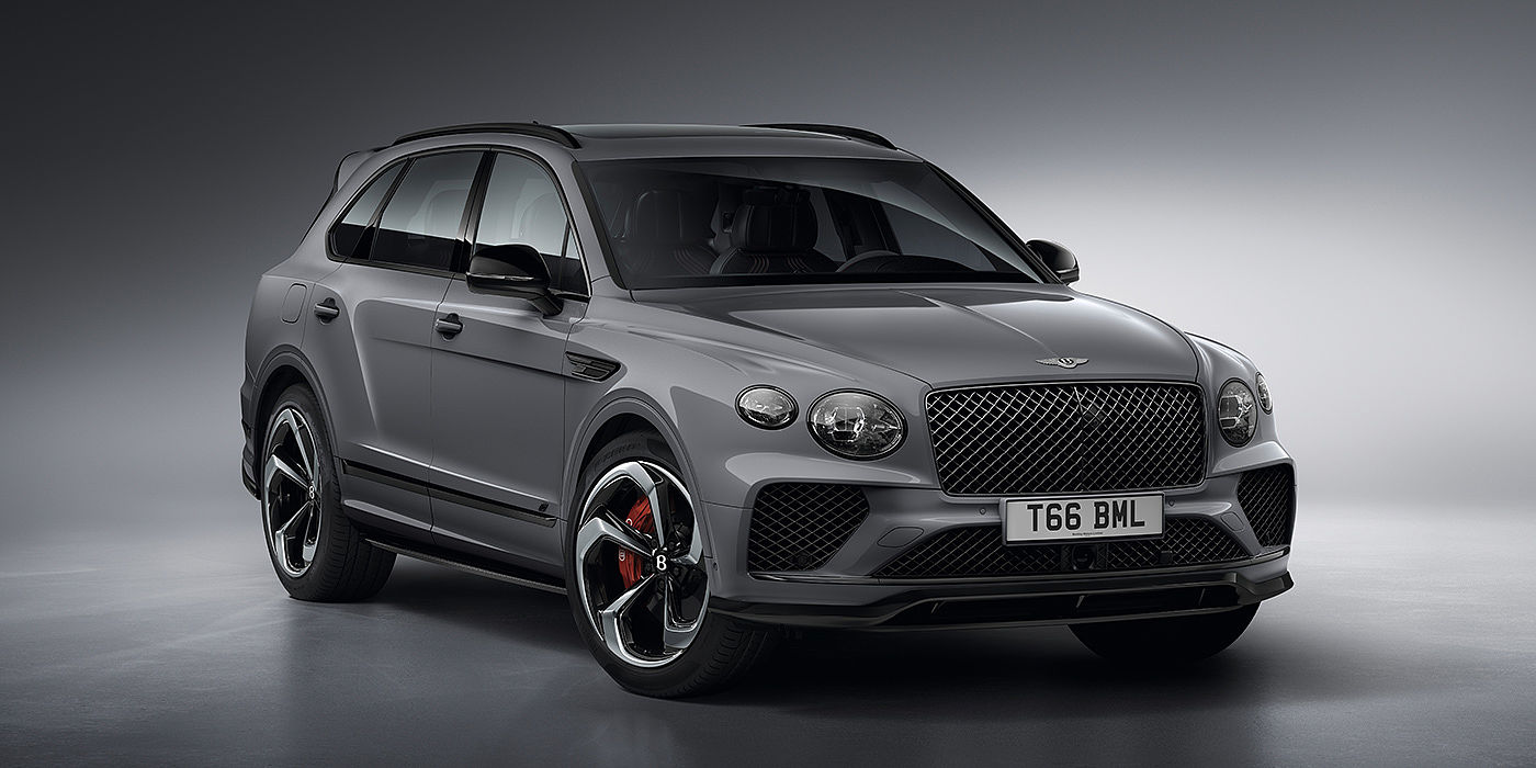Bentley Chongqing Bentley Bentayga S in Cambrian Grey paint front three - quarter view with dark chrome matrix grille and featuring elliptical LED matrix headlights. 