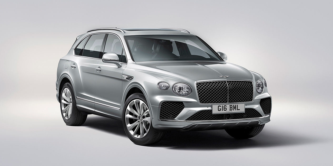 Bentley Chongqing Bentley Bentayga in Moonbeam paint, front three-quarter view, featuring a matrix grille and elliptical LED headlights.